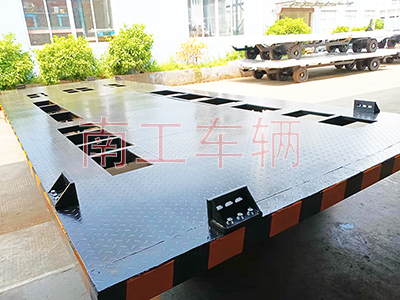 1672451982523596.jpg 13點(diǎn)5噸箱變拖車底盤 全掛式平板拖車3I.jpg